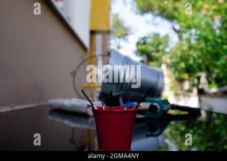 tools and screws in different buckets. everybody have different abilities some are better some are worse. Stock Photo