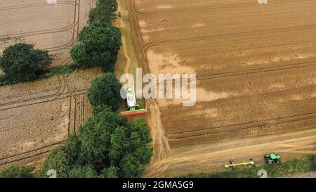 Combine harvester at work in North Yorkshire Stock Photo