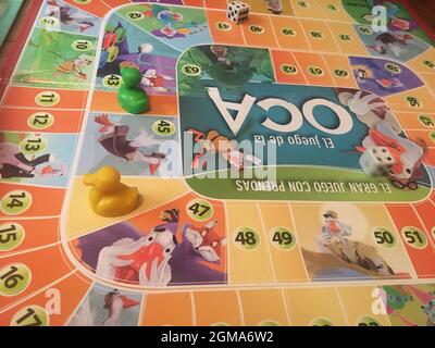 children playing a board game Stock Photo