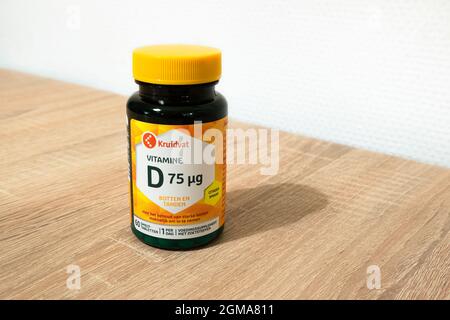 Wetland Scheiding item Bottle of vitamine D capsules from the brand Kruidvat on a table Stock  Photo - Alamy