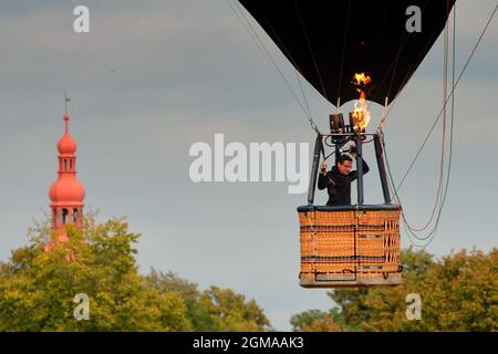 September 17, 2021, Bela pod Bezdezem, Czech Republic: Hot air balloons fly over the church during the 19th Czech Hot-air Balloons Festival ''Belske hemzeni'' will take place in Bela pod Bezdezem (Credit Image: © Slavek Ruta/ZUMA Press Wire) Stock Photo