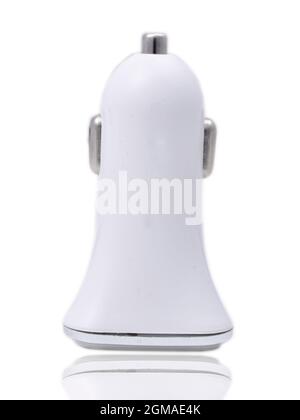 white USB electronics device car charger isolated on white background Stock Photo