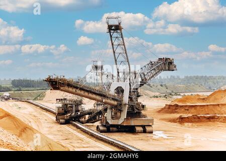 Giant bucket wheel excavator. The biggest excavator in the world. The largest land vehicle. Excavator in the mines. Stock Photo
