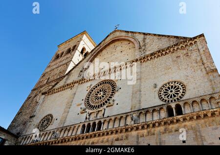 Facade of Assisi Cathedral or Cattedrale di San Rufino in Romanesque style with beautiful ornate  rose window Stock Photo