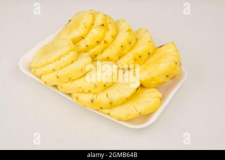 Closeup of Pineapple Slice Isolated on White Background Stock Photo