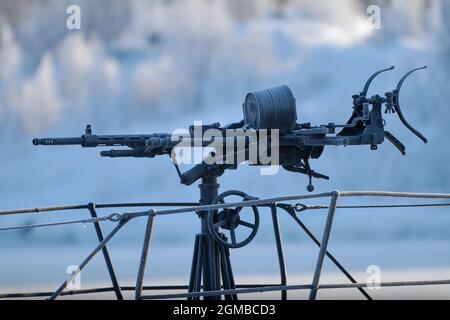 Helsinki, Finland - January 15, 2021: 20 mm Madsen anti-aircraft gun mounted on the front deck of a Finnish WW II era museum submarine Vesikko in the Stock Photo