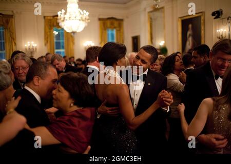 Feb. 22, 2009“This was the first formal function at the White House in the administration: the Governors Ball. The President dances with his wife while singing along with the band Earth, Wind and Fire.” (Official White House photo by Pete Souza)  This official White House photograph is being made available only for publication by news organizations and/or for personal use printing by the subject(s) of the photograph. The photograph may not be manipulated in any way and may not be used in commercial or political materials, advertisements, emails, products, promotions that in any way suggests ap Stock Photo