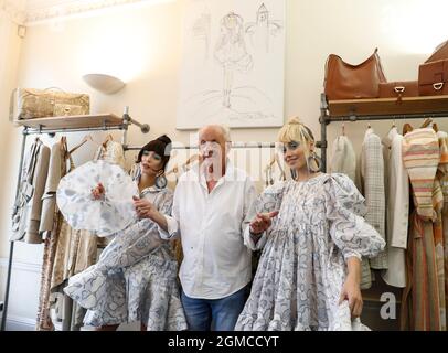 London, UK. 17th Sep, 2021. Designer Paul Costelloe (C) poses for a photo with models during London Fashion Week in London, UK, on Sept. 17, 2021. Credit: Han Yan/Xinhua/Alamy Live News Stock Photo