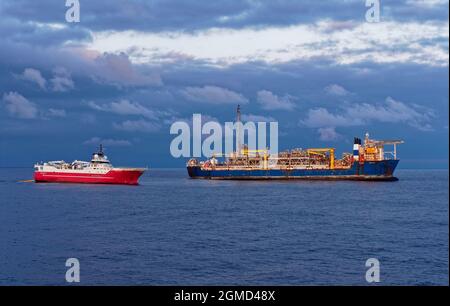 The Sanco Swift Seismic Source Vessel on Close Pass Operations near to the Alvheim FPSO in the Norwegian North Sea. Stock Photo