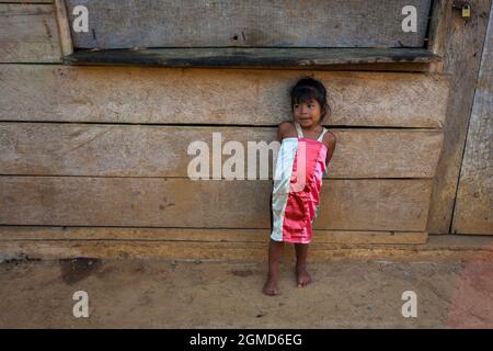 A young embera indian girl in the La Bonga village beside Rio Pequeni, Chagres national park, Republic of Panama, Central America. Stock Photo