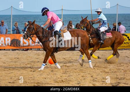 Sandbanks, Poole, Dorset, UK . 17th September 2021. The Sandpolo British Beach Polo Championships gets underway at Sandbanks beach, Poole on a warm sunny day. The largest beach polo event in the world, the two day event takes place on Friday and Saturday, as visitors head to the beach to see the action. Credit: Carolyn Jenkins/Alamy Live News Stock Photo