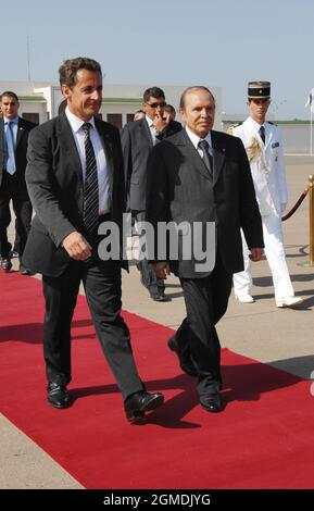 Algerian president Abdelaziz Bouteflika says goodbye to French president Nicolas Sarkozy at the Houari Boumedienne Airport in Algiers after an official trip in Algeria, on July 10, 2007. Photo by Christophe Guibbaud/ABACAPRESS.COM Stock Photo