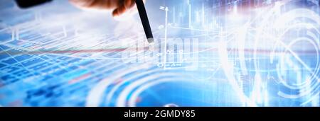 Business concept. Information technology and data processing. Hands over the screen graphic data. A modern software product in business. Stock Photo