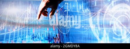 Business concept. Information technology and data processing. Hands over the screen graphic data. A modern software product in business. Stock Photo