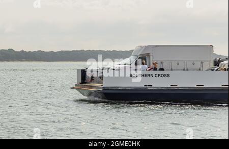 People on the bow of the Southern Cross, Shelter Island Ferry Stock Photo