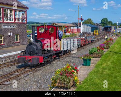 Hunslet 040 ST ' Maid Marian ' at Llanuwchllyn Station with a slate wagon train  on the Bala Lake Railway,Gwynedd, Wales Stock Photo