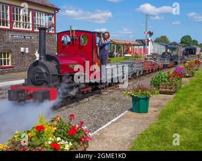 Hunslet 040 ST ' Maid Marian ' at Llanuwchllyn Station with a slate wagon train  on the Bala Lake Railway,Gwynedd, Wales Stock Photo