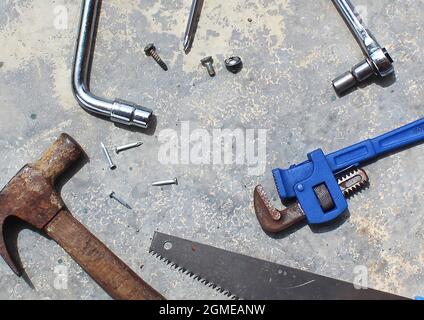 Top view of hardware tools on concrete floor with copy space for text Stock Photo