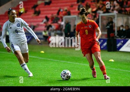 Llanelli, Wales. 17 September, 2021. Angharad James of Wales Women under pressure from Bibigul Nurusheva of Kazakhstan Women during the FIFA Women's World Cup 2023 Qualifier group I match between Wales and Kazakhstan at Parc y Scarlets in Llanelli, Wales, UK on 17, September 2021. Credit: Duncan Thomas/Majestic Media/Alamy Live News. Stock Photo