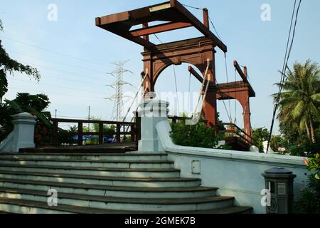 Jembatan Gantung Kota Intan is the name for this disused bridge. In the past, this bridge could be lifted and lowered again if a boat passed under it. Stock Photo