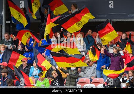 Cottbus, Germany. 18th Sep, 2021. Football, Women: World Cup qualifying Europe women, Germany - Bulgaria, group stage, group H, matchday 1, at Stadion der Freundschaft. Fans wave German flags. Credit: Robert Michael/dpa-Zentralbild/dpa/Alamy Live News Stock Photo