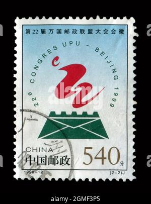 Stamp printed in China shows image of the 1998-12 Emblem of 22nd Congress of Universal Postal Union, circa 1998. Stock Photo