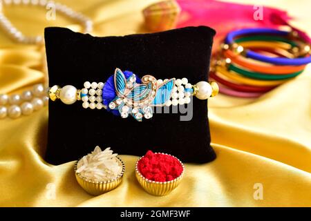 Beautiful Rakhi with Roli and Chawal Stock Photo