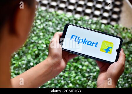 New Delhi, India - 13 September, 2019: Woman using flipkart on smartphone, flipkart biggest ecommerce company in India Stock Photo