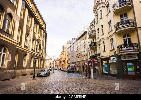 POZNAN, POLAND - Nov 12, 2018: A narrow street with old buildings in Poznan, Poland Stock Photo