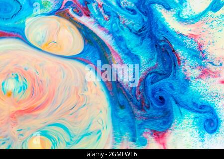 Abstract multicolored liquid background. Abstract ink design template mixed texture background. Psychedelic multicolored pattern. Fluid art Stock Photo