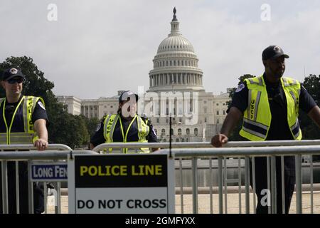 Police officers stand guard around a perimeter of the U.S. Capitol during the Justice for J6 rally in support of defendants being prosecuted in the January 6 attack on Capitol Hill in Washington on September 18, 2021. Photo by Yuri Gripas/ABACAPRESS.COM Stock Photo