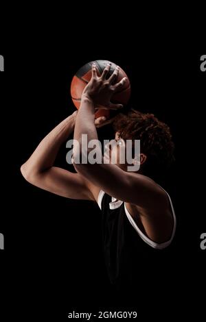 Silhouette of man, basketball player in motion during game, dribble ...
