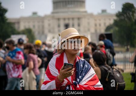 Washington, USA. 18th Sep, 2021. A protester attends the 'Justice for J6' rally, a protest of the treatment of those arrested on January 6th during the storming of the U.S. Capitol, in Washington, DC on September 18, 2021. (Photo by Matthew Rodier/Sipa USA) Credit: Sipa USA/Alamy Live News Stock Photo