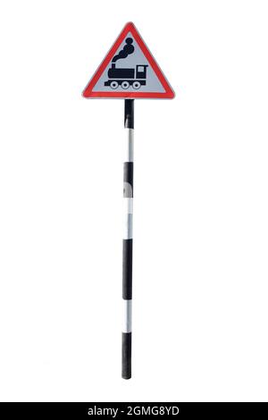 Iron pole with road sign indicating approaching railway crossing on white clipping background Stock Photo