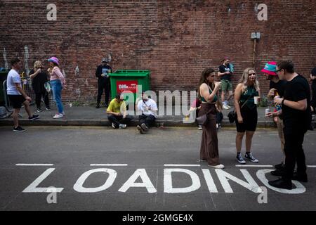 Manchester, UK. 18th Sep, 2021. People gather on Temperance Street ahead of the Repercussion Festival.ÊThe new day and night event sees the further regeneration of Mayfield that is host to over five stages, including the legendary Star & Garter pub. Credit: Andy Barton/Alamy Live News Stock Photo