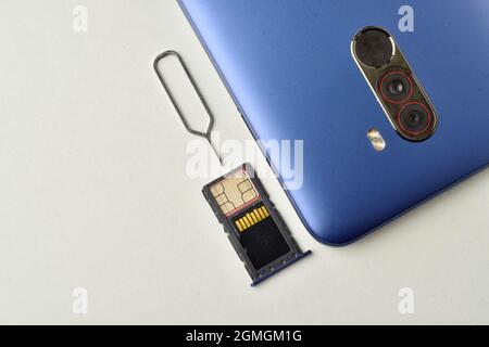 Smartphone with sim and memory card  isolated on white background Stock Photo