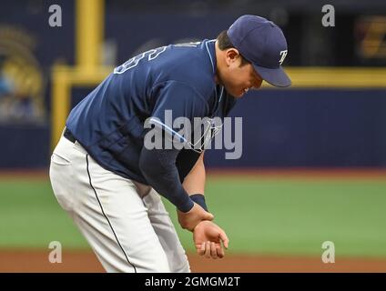 St. Petersburg, United States. 18th Sep, 2021. Tampa Bay Rays' Ji-Man Choi holds his wrist after a collision at first base with Detroit Tigers' Derek Hill during the fifth inning at Tropicana Field in St. Petersburg, Florida on Saturday, September 18, 2021. Photo by Steven J. Nesius/UPI Credit: UPI/Alamy Live News Stock Photo