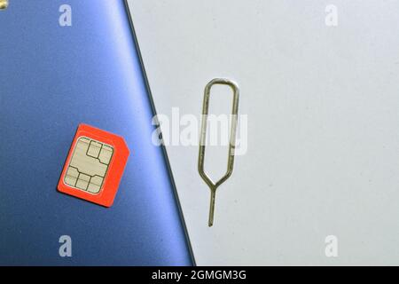 Sim with Ejector pin Isolated on White Background Stock Photo
