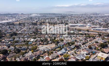 Daytime aerial view of dense residential sprawl in the Bay Area city of Richmond, California, USA. Stock Photo