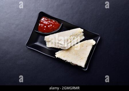 White Bread Sandwich Served with Ketchup Stock Photo