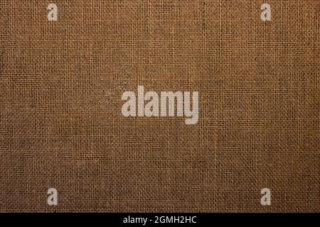 Close-up burlap sack textured background; brown, rustic, woven cloth texture Stock Photo