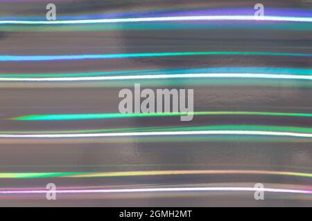 Holographic multicolored background; neon holofoil, wrinkled abstract foil Stock Photo