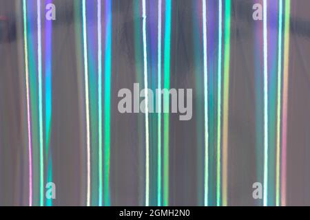 Holographic multicolored background; neon holofoil, wrinkled abstract foil Stock Photo