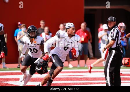 Bloomington, United States. 18th Sep, 2021. University of Cincinnati's Coby Bryant removes his helmet after intercepting the ball during an NCAA football game at Memorial Stadium. IU lost to Cincinnati 38-24. (Photo by Jeremy Hogan/SOPA Images/Sipa USA) Credit: Sipa USA/Alamy Live News Stock Photo