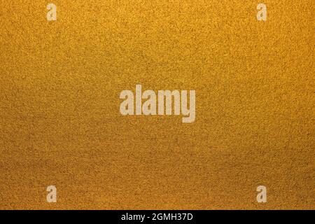 Soft gold background texture, subtle textured golden paper Stock Photo