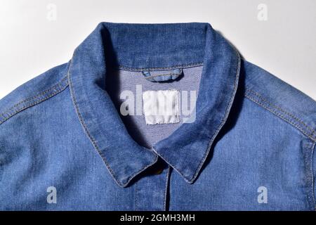Collar of Blue Denim Jacket isolated on white background Stock Photo
