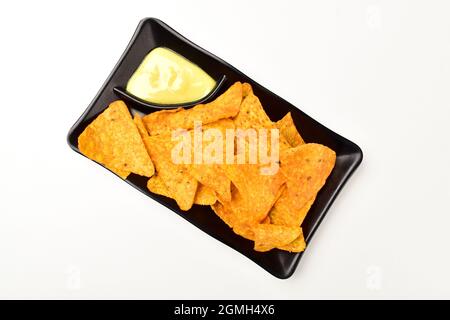 Top View of Nachos in Plate Isolated on White Background with Clipping Path Stock Photo