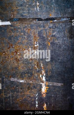 Textural close-up of tape residue on rusty iron, Shek O, Hong Kong Stock Photo