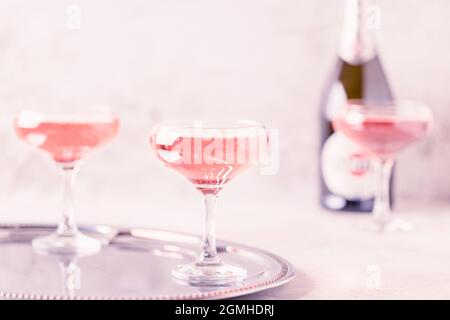 Champagne or wine in glasses on light background. Copy space. Stock Photo