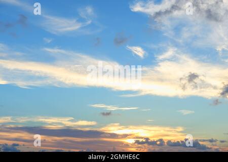 Beautiful colored cloudy evening sky. Sky with clouds at sunset. Abstract sky background. Stock Photo